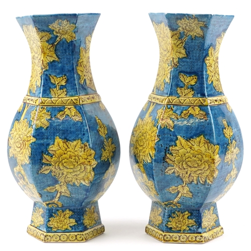 1396 - Pair of Chinese porcelain hexagonal blue ground vases hand painted with flowers, each 40cm high