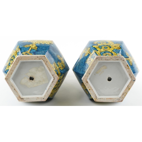 1396 - Pair of Chinese porcelain hexagonal blue ground vases hand painted with flowers, each 40cm high