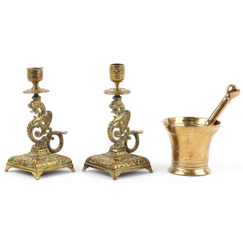 492 - Antique bronze pestle & mortar and pair of dragon design candlesticks, the largest 19,5cm high