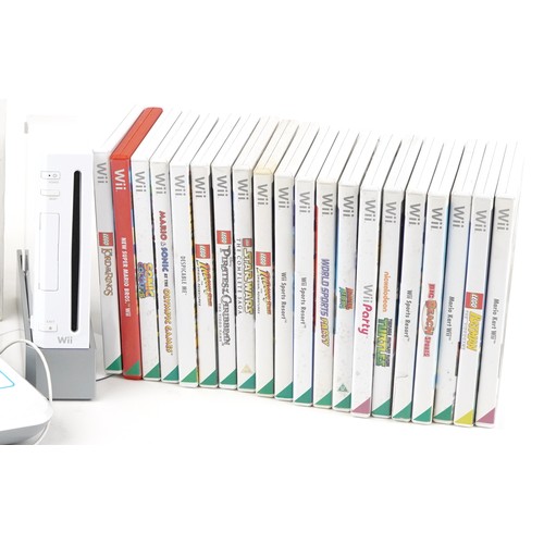 1594 - Nintendo Wii games console with accessories and a collection of games including U Drew, Wii Sports R... 