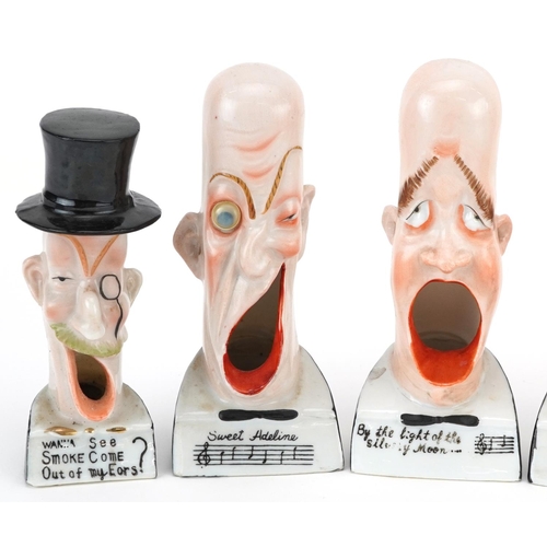 538 - Manner of Schafer & Vater, eight smoking interest early 20th century German porcelain smoking head a... 