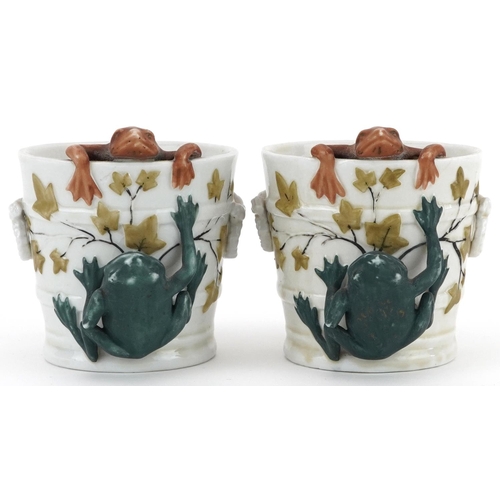 130 - Pair of 19th century continental porcelain comical cache pots in the form of buckets mounted with fr... 