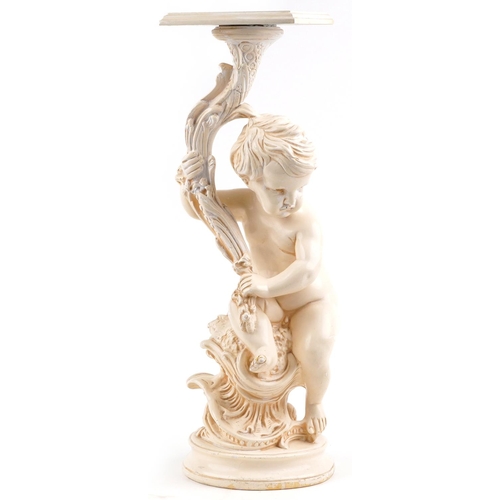 1403 - Classical plaster stand in the form of a nude Putti holding a cornucopia, 70cm high