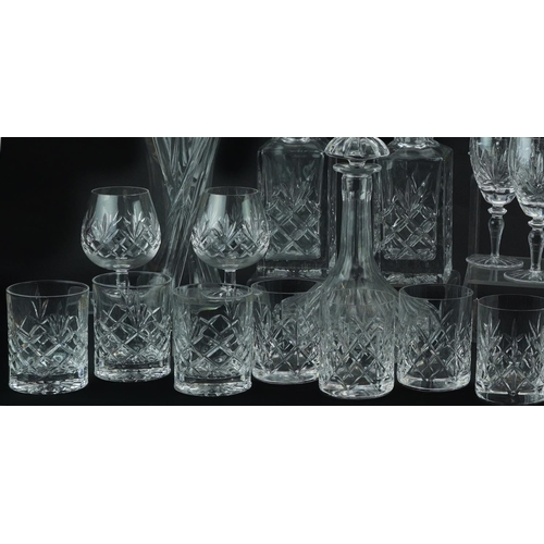 1404 - Glassware including Boyne Valley tumblers, three decanters and set of six Champagne flutes, the larg... 