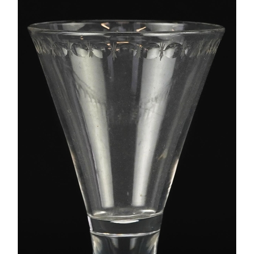 133 - 18th century excise wine glass with hollow stem, 15cm high