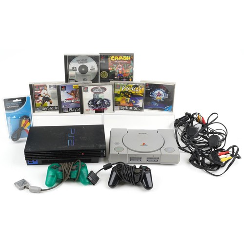 1598 - Sony PlayStation 2 games console with controller and a Sony PlayStation 1 games console with control... 