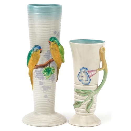 168 - Clarice Cliff, two Art Deco cylindrical and tapering vases including one decorated in relief with tw... 