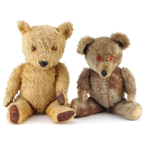 1624 - Two early 20th century straw filled teddy bears with jointed limbs including a golden example with b... 