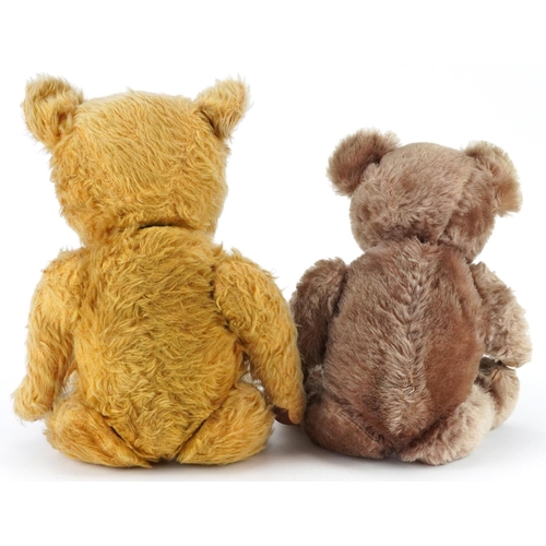 1624 - Two early 20th century straw filled teddy bears with jointed limbs including a golden example with b... 