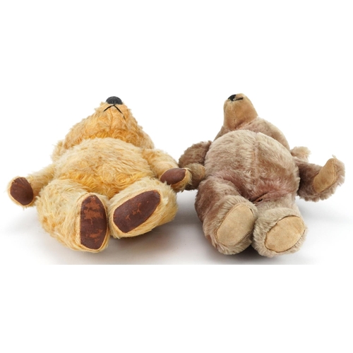 1624 - Two early 20th century straw filled teddy bears with jointed limbs including a golden example with b... 