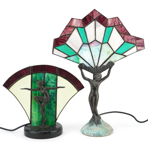 550 - Two bronzed and leaded glass figural table lamps, each mounted with a nude or semi nude Art Deco fem... 