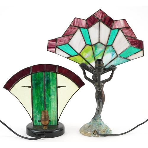 550 - Two bronzed and leaded glass figural table lamps, each mounted with a nude or semi nude Art Deco fem... 