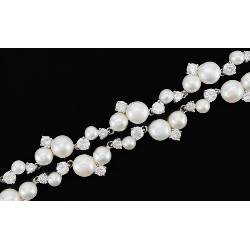 2232 - Silver cubic zirconia and cultured pearl collar necklace, 42cm in length, 43.4g