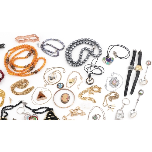 2804 - Vintage and later costume jewellery, wristwatches and objects, some silver, including amber coloured... 