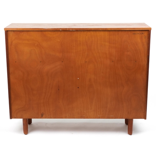 1168 - Avalon, mid century teak side cabinet fitted with a fall and two drawers above a pair of glass slidi... 