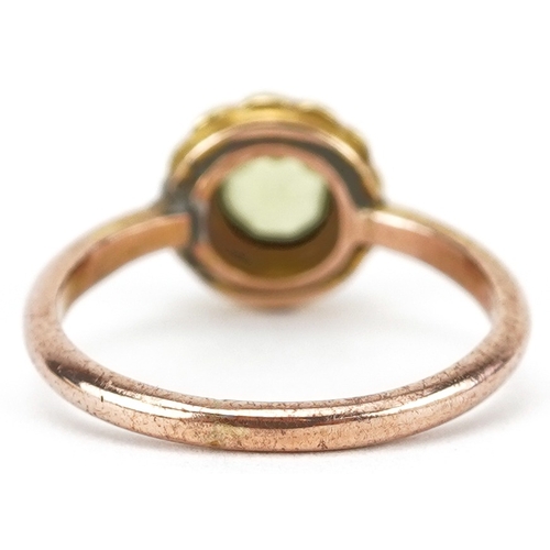 2243 - Gold peridot and seed pearl cluster ring, indistinct marks, tests as 15ct gold, the peridot approxim... 
