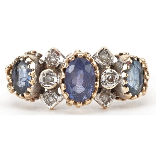 2214 - 9ct gold sapphire and diamond cluster ring, the largest sapphire approximately 6.60mm x 4.70mm x 2.9... 