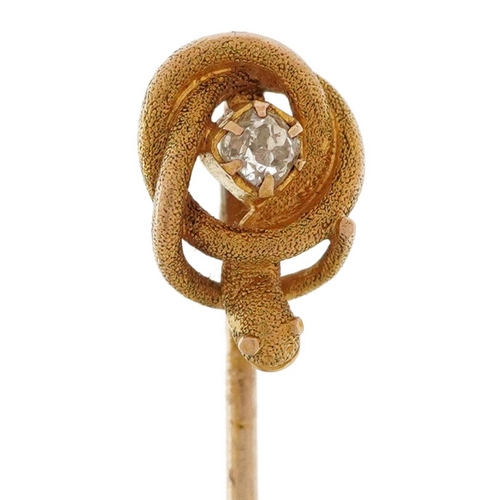 2249 - Unmarked gold and yellow metal diamond solitaire stickpin in the form of a serpent, the serpent test... 