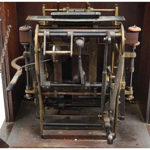 597 - Gledhill-Brook Time Recorders patent oak clocking in machine having circular dial with Roman numeral... 