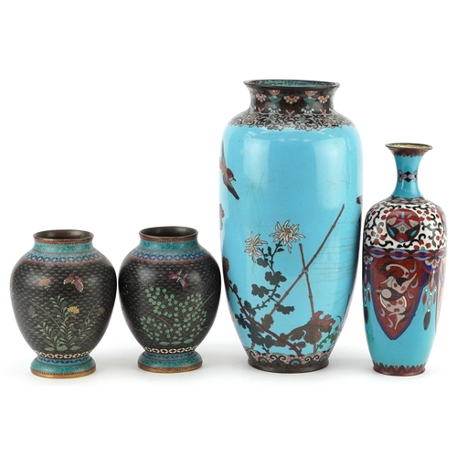 263 - Four Japanese cloisonne vases including a pair enamelled with butterflies amongst flowers and an exa... 