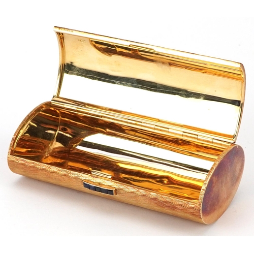 29 - Boucheron, 18ct gold engine turned  minaudière with sapphire set clasp, housed in a Boucheron London... 