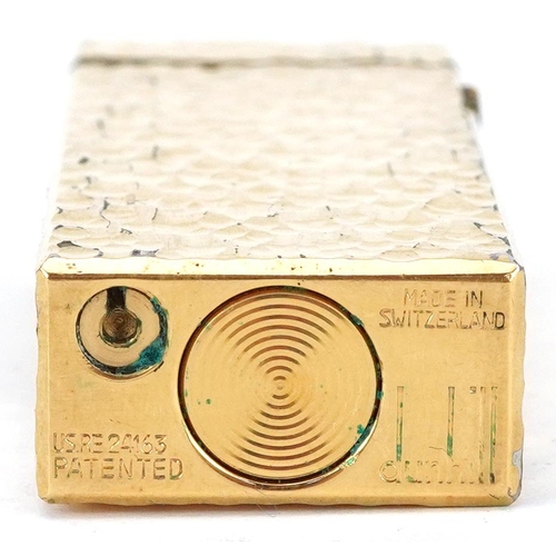 79 - Dunhill gold plated bark design pocket lighter with box, 6.5cm high
