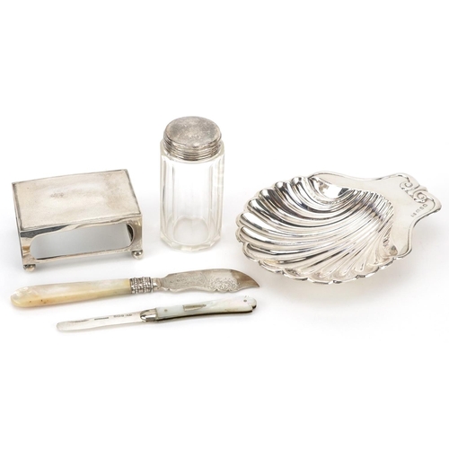 236 - Edwardian and later silver items including a shell shaped dish, rectangular matchbox holder, mother ... 