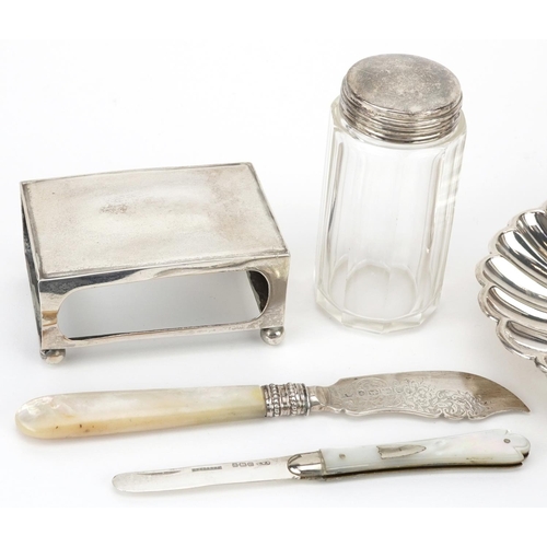 236 - Edwardian and later silver items including a shell shaped dish, rectangular matchbox holder, mother ... 