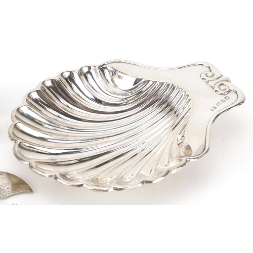 236 - Edwardian and later silver items including a shell shaped dish, rectangular matchbox holder, mother ... 