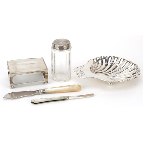 236 - Edwardian and later silver items including a shell shaped dish, rectangular matchbox holder, mother ... 