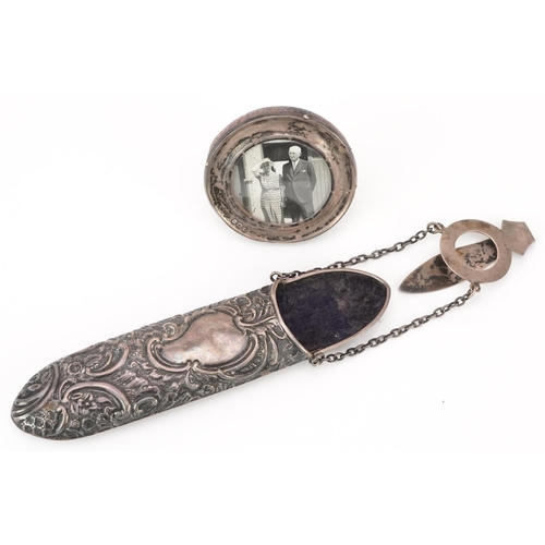 305 - Silver items comprising Edwardian silver chatelaine spectacle case profusely embossed with flowers a... 