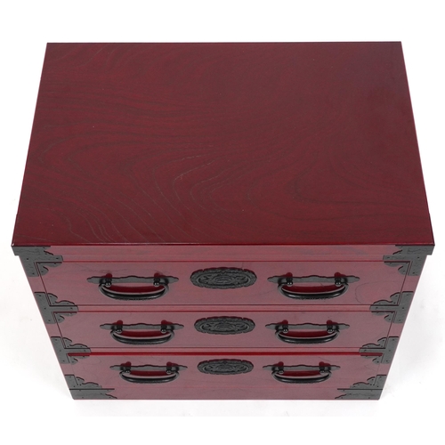 1050 - Chinese cherry wood type three drawer chest with cast black metal mounts, 57cm H x 60cm W x 40.5cm D