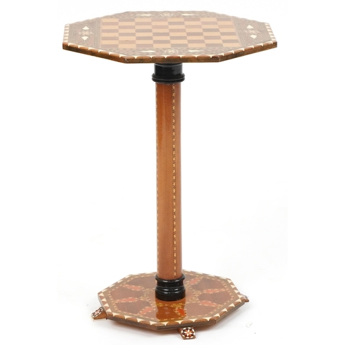 1178 - Manner of Liberty & Co, Moorish style inlaid chess occasional table with octagonal top and base, 50c... 