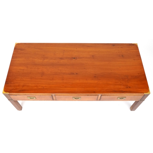 1103 - Military interest yew wood campaign style coffee table with three frieze drawers and brass mounts, 4... 