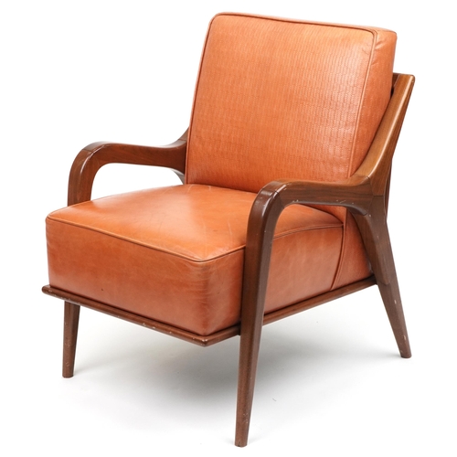 Scandinavian design hardwood lounge chair having a tan upholstered back and seat, 86cm H x 62.5cm W x 71cm D