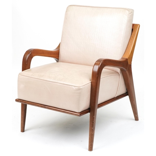 1110 - Scandinavian design hardwood lounge chair having a cream upholstered back and seat, 86cm H x 62.5cm ... 