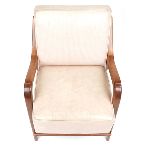 1110 - Scandinavian design hardwood lounge chair having a cream upholstered back and seat, 86cm H x 62.5cm ... 