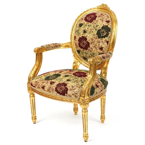 1162 - French Baroque style giltwood elbow chair having cream, red and green floral upholstery, 96.5cm high