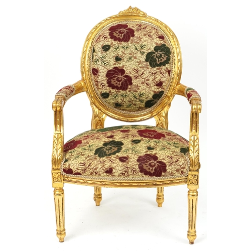 1162 - French Baroque style giltwood elbow chair having cream, red and green floral upholstery, 96.5cm high