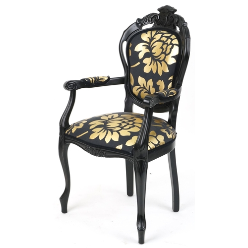 1218 - French style black painted elbow chair with black and gold floral upholstery, 103cm high