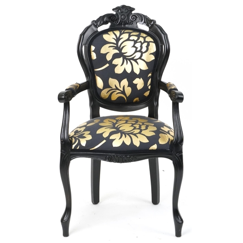 1218 - French style black painted elbow chair with black and gold floral upholstery, 103cm high