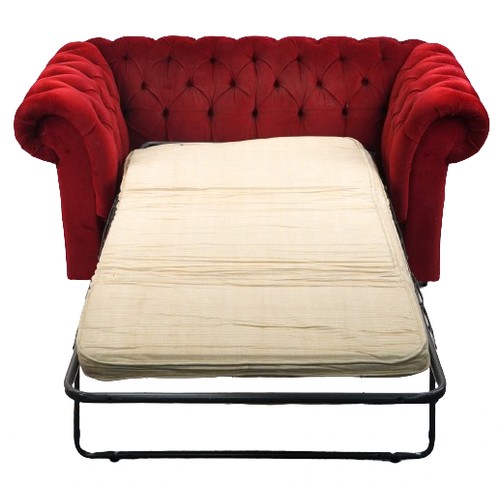 1179 - Chesterfield two seater settee/sofa bed with red button back upholstery, 73cm H x 152cm W x 88cm D