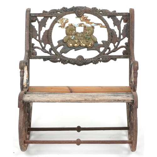 1118 - Child's painted cast iron rocking chair with wooden slats, cast with teddy bears and animals, 50cm h... 