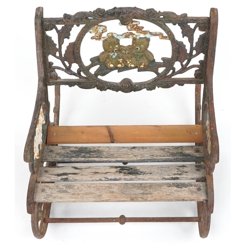 1118 - Child's painted cast iron rocking chair with wooden slats, cast with teddy bears and animals, 50cm h... 