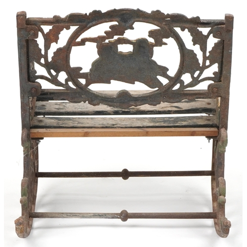 1118 - Child's painted cast iron rocking chair with wooden slats, cast with teddy bears and animals, 50cm h... 