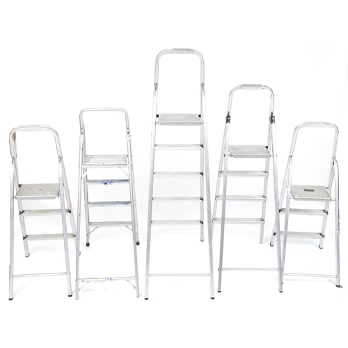 1165A - Five aluminium folding stepladders, the largest 168cm high when closed