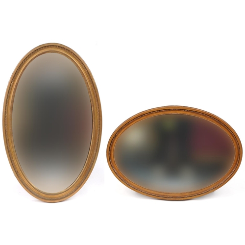 1240 - Two oval gilt framed wall mirrors with bevelled glass, the largest 93cm x 58cm