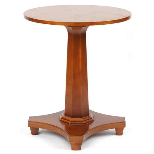 1176A - William L Maclean, Art Deco style hardwood centre table with circular top and octagonal tapering col... 