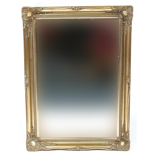 1241 - Two rectangular gilt framed wall mirrors with bevelled glass, 127cm x 37.5cm and 91cm x 65.5cm