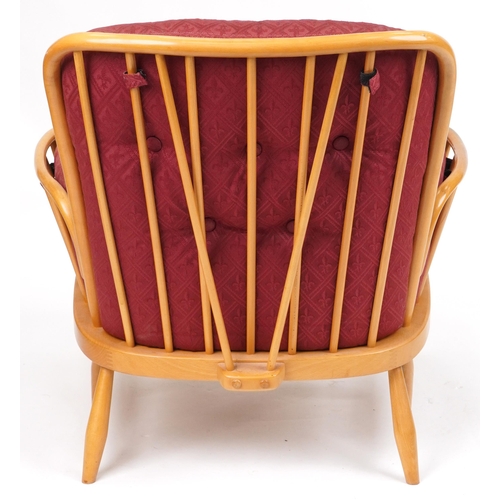 1071 - Ercol light elm Jubilee stick back armchair with red fleur de lis upholstered cushioned seats, 83cm ... 